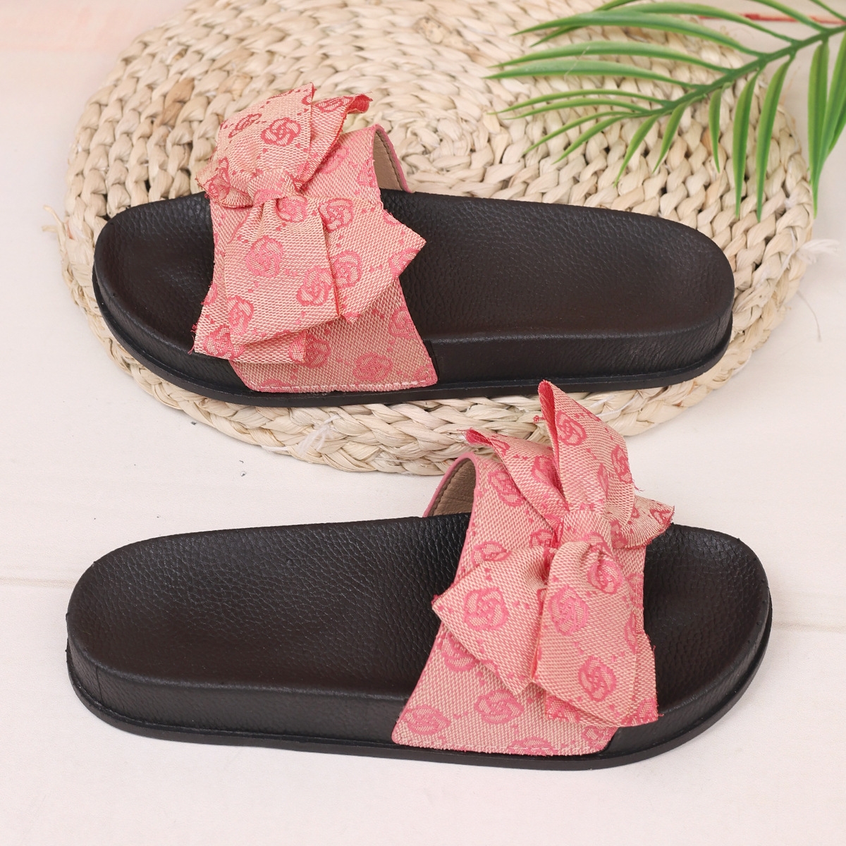 Fashionable large-sized thick-soled bow one-line slippers for women wearing embroidered beach flip-flops in black, pink, khaki and gray