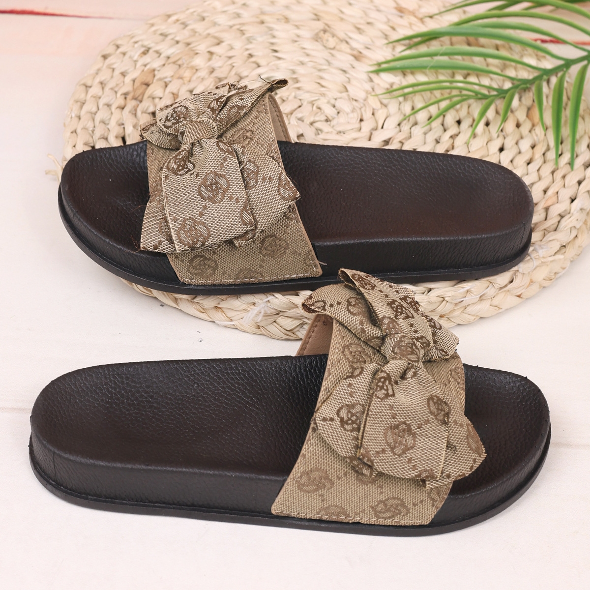 Fashionable large-sized thick-soled bow one-line slippers for women wearing embroidered beach flip-flops in black, pink, khaki and gray