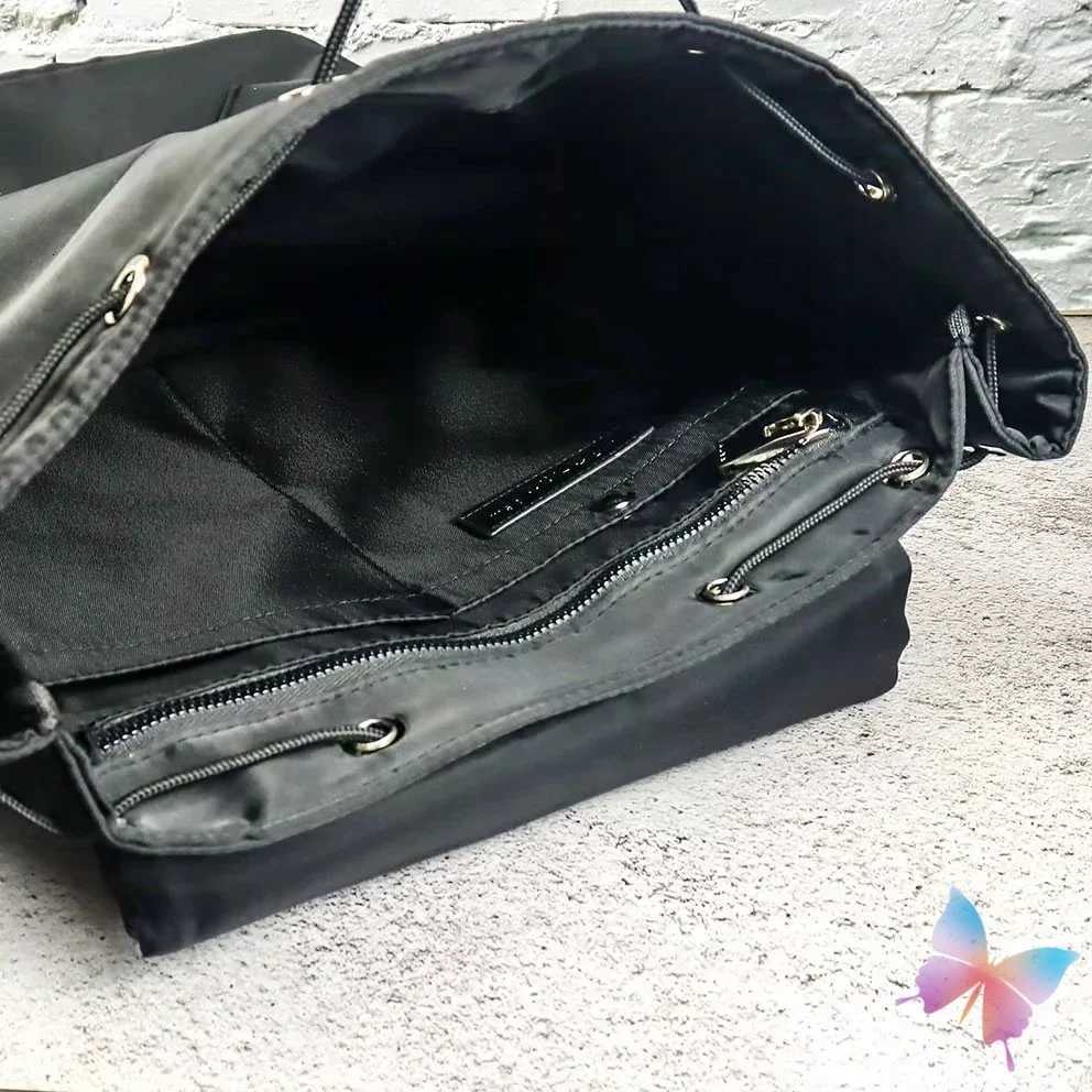 Black 1017 ALYX 9SM Backpacks Large Capacity Drawstring Nylon Function Tactical Metal Socket Letter Flip Bucket BagsW251118