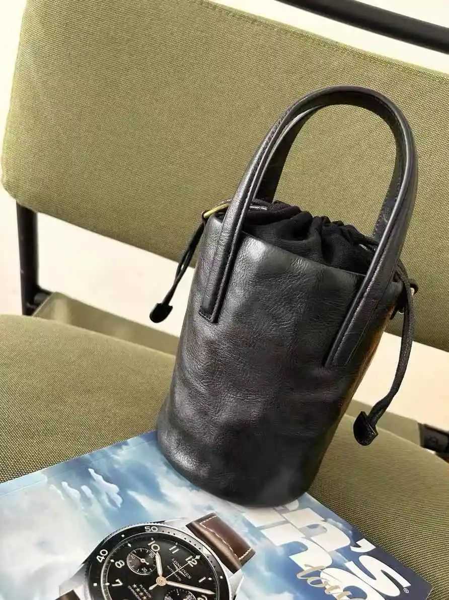 Womens New Retro Drawstring Bucket Bag Black Versatile Simple Handbag PU Leather Single Shoulder Crossbody BagW251118