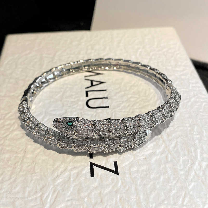 Powerful and realistic snake-skin bracelet in the shape of a snake. European-style, personalized green-eyed serpentine wristband. Retro accessory S251 - view 3