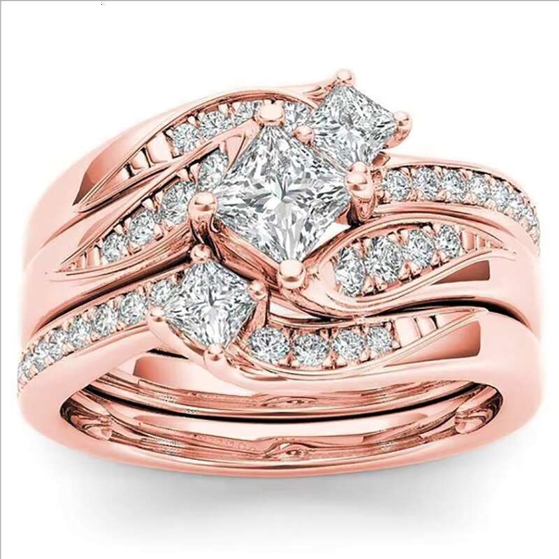 DHcollections Rose Gold Plated Simulated Dia Micro Set With Zircon Three Engagement Ring