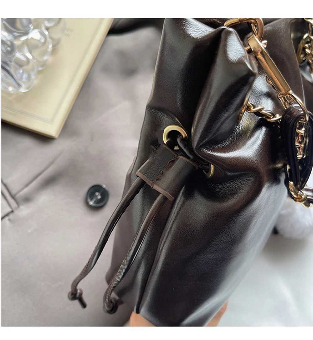 Womens Bag Autumn Chain Shoulder Bucket Bag 2025 New Style PU Leather Drawstring Korean Style Casual Messenger BagsW251118