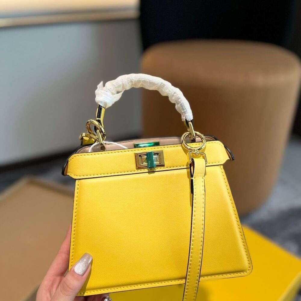 F brand designer's luxurious casual style PEEKABOO series identical lock-pattern shoulder bag. New crossbody bag. High-end leather handbag. Cat-shaped handbag.