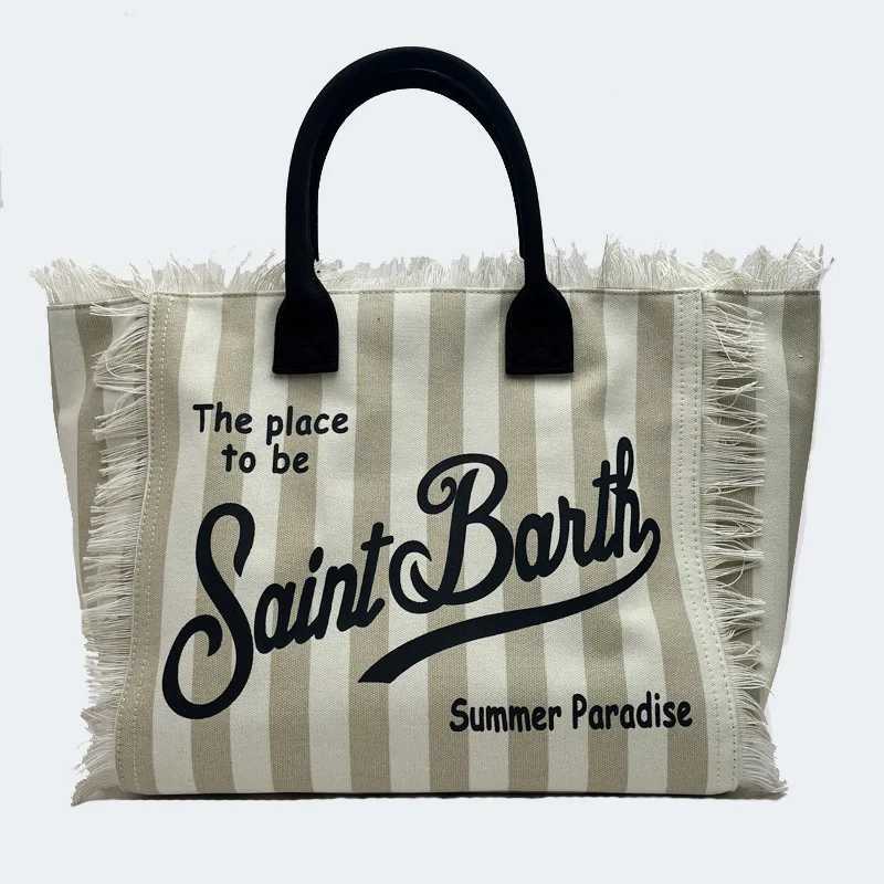 New Womens Large Capacity Casual Beach Canvas Striped Tassel Handbag from Saint Bart Europe and the United StatesW250420