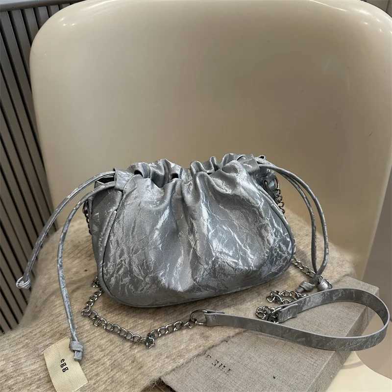 2025 Fashion Women Tote Drawstring PU Leather Bucket Bag Versatile New Handbags Chain Cloud Bag Simple Commute Shoulder BagsW251118