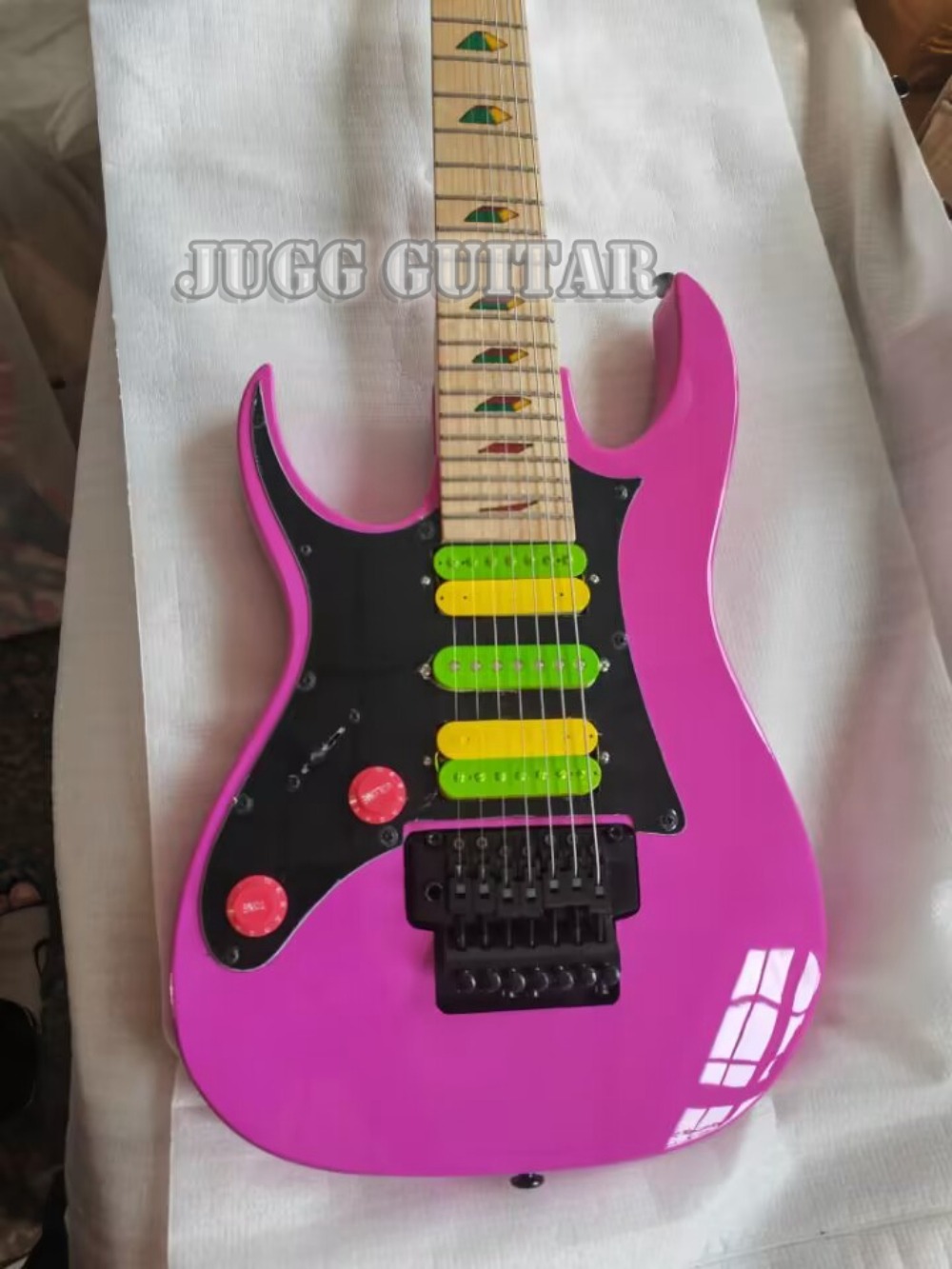 Left Handed UV777 Universe 7 String Vai Pink Electric Guitar HSH Pickups, Floyd Rose Tremolo, Locking Nut, Disappearing Pyramid inlay, Black Hardware