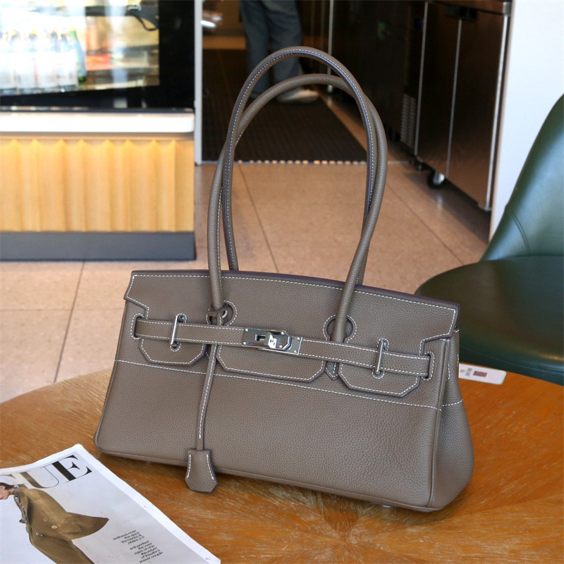 2025 New Designer Genuine Leather Underarm Handbag, One Shoulder Fashion Trend, Top Leather Handbag from Togo