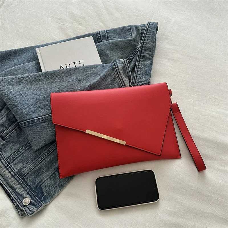 New PU Womens Leather Bag 2024 Luxury Handbag Designer Womens Wrist Bag Sac A Sunday Clutch Party WalletW250418