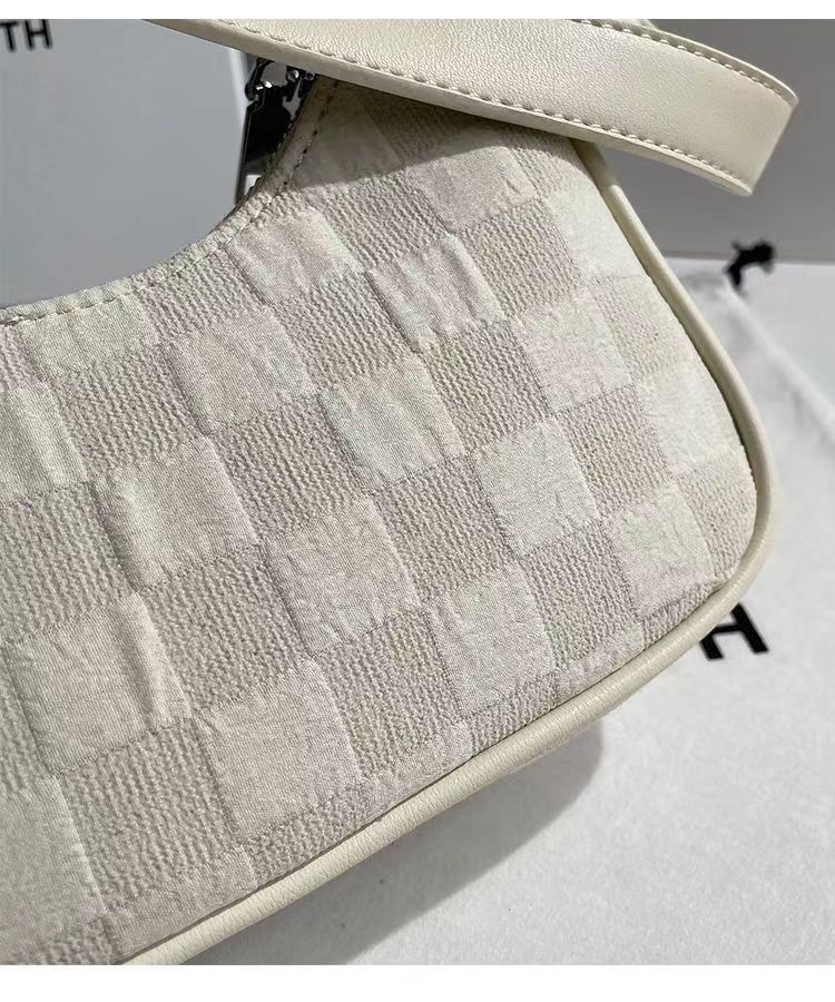 2025 New Niche Cream Crescent Bag for Women: High - end Baguette Shoulder and Underarm Bag for Autumn and Winter