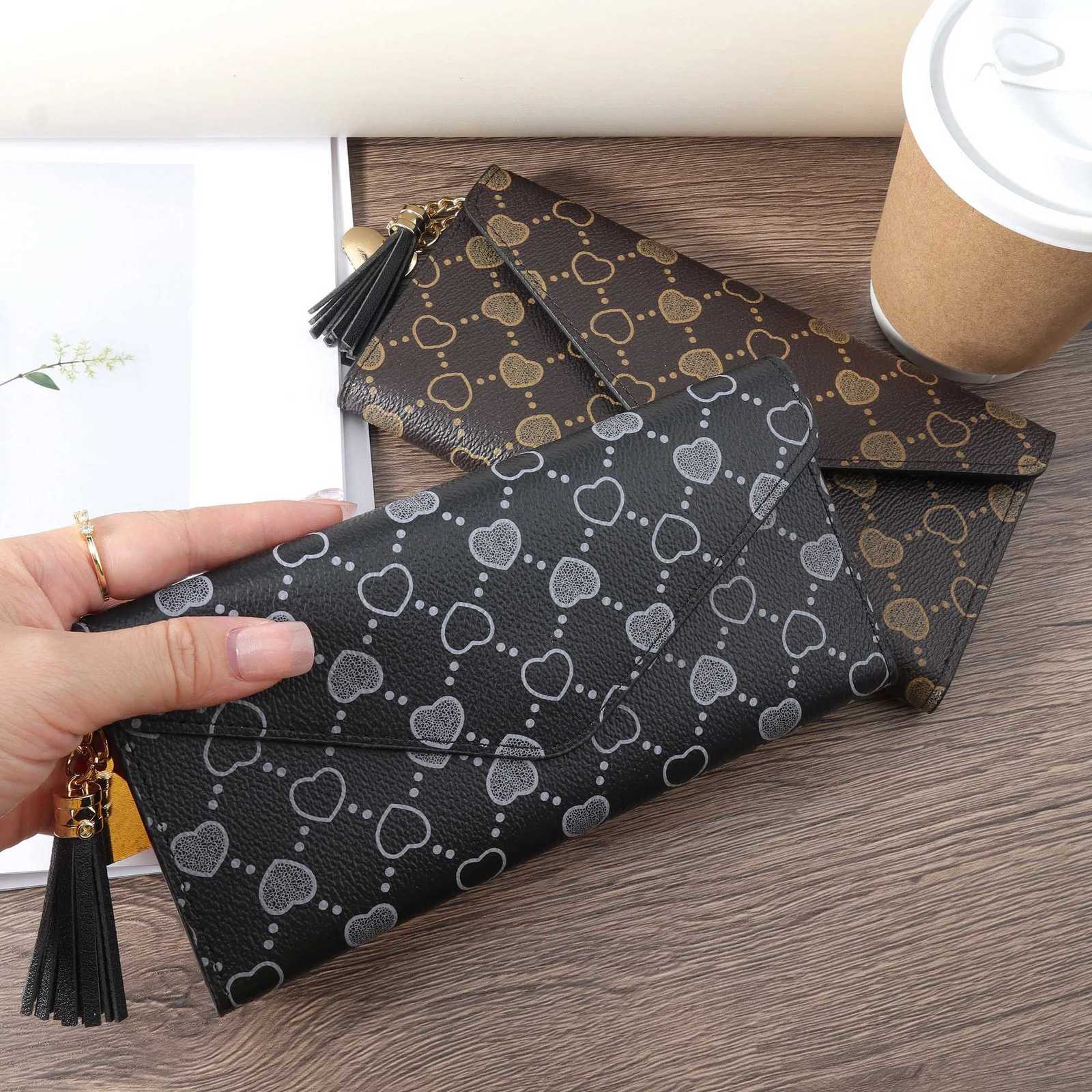 Tassel decorated long wallet elegant PU leather folding wallet for women with card slot and zipper pocketW251119