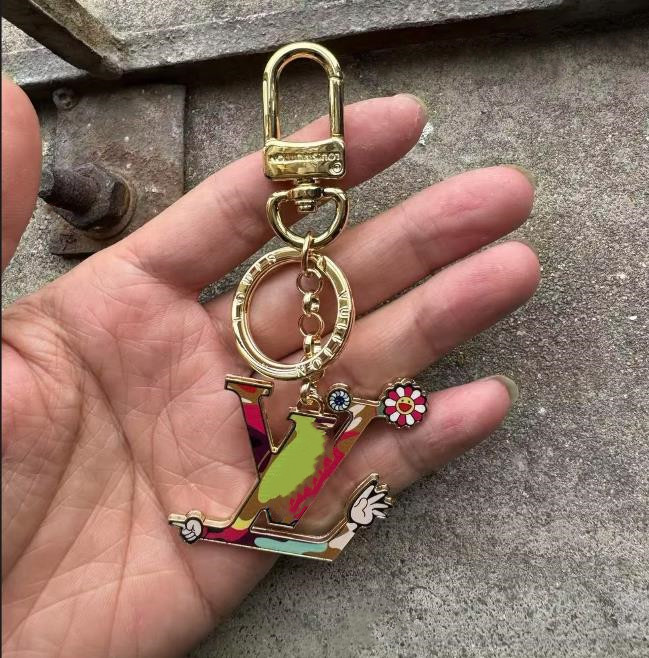 Charm Luxury Paris Designer Keychains 20 Style Brand Keyring Fashion Metal Leather Key Chain Charm Fashion Bags Pendant Handbags Car keychain purse Ke