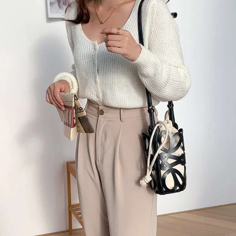 Korean Version Niche Design Cydrical Bucket Canvas Shoulder Women's Crossbody Versatile Pu Hollow Bag