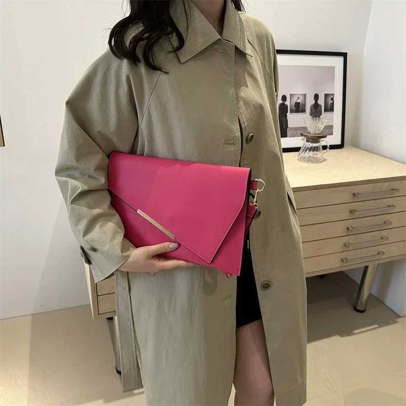 New PU Womens Leather Bag 2024 Luxury Handbag Designer Womens Wrist Bag Sac A Sunday Clutch Party WalletW250418