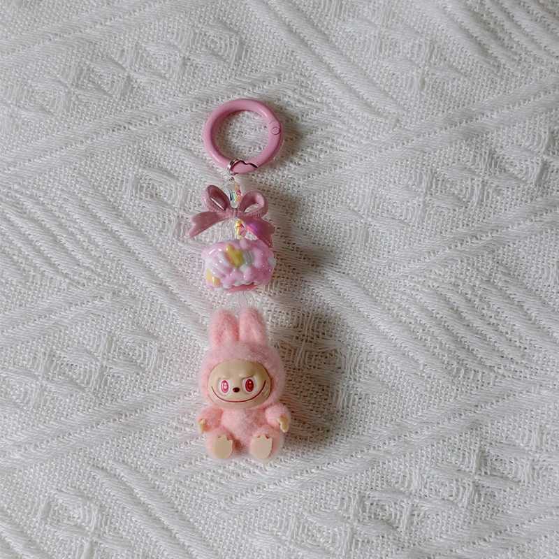 New Mini Labubu Kawaii Particle Bow Keychain Creative 3D Doll Bag Phone Charm Keychain Male and Female Gifts M250419