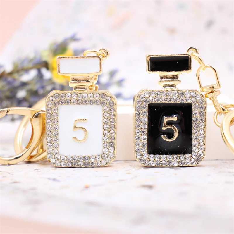 Creative Perfume Bottle Keychain Women Bag Charm Crystal Rhinestone Key Chain Ring Fashion Key Holder Car Keyrings TrinketW251120