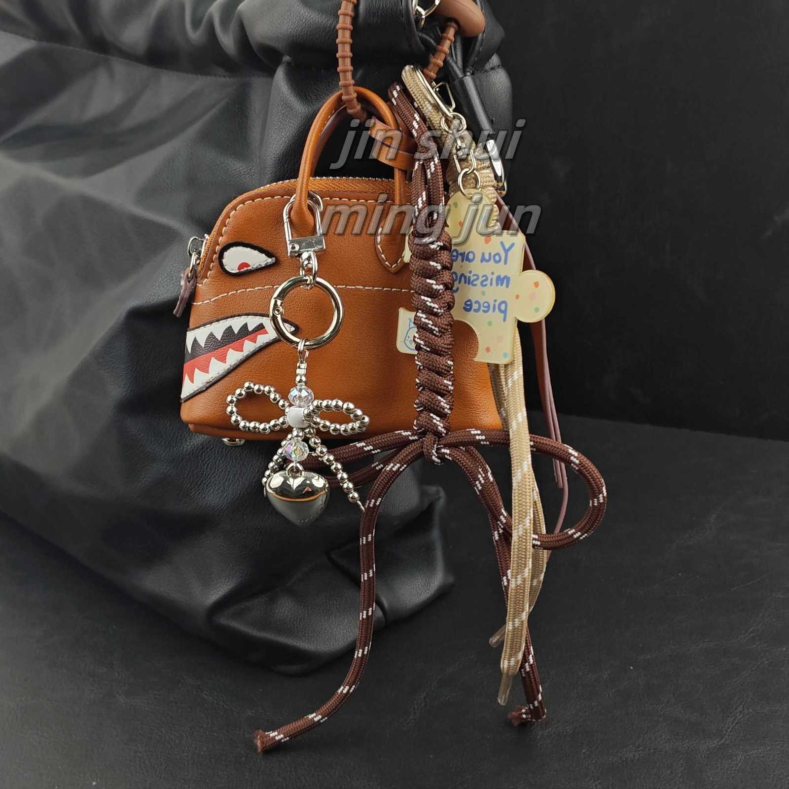 2025 New Extremely Complicated Bag Pendants Versatile Money Bag Charms Keychains Hanging Braided Rope Luxury Birthday GiftW251120