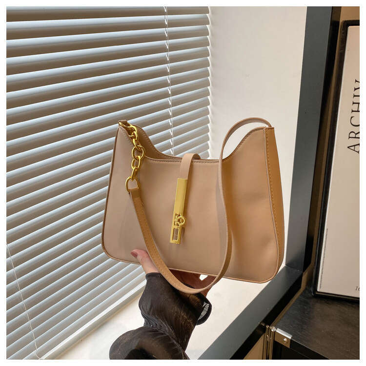 Korean niche design handbag for women in autumn winter 2025, new texture handheld underarm bag, versatile and fashionable shoulder bag