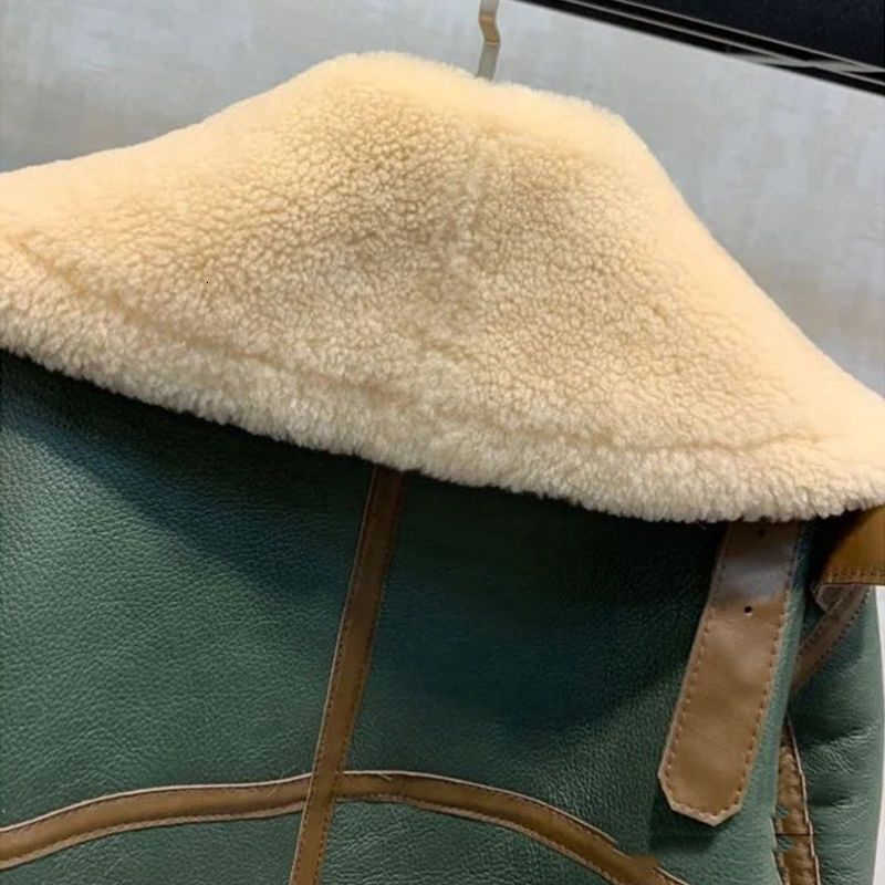 Plus-size women's winter 2025 clothing - wide lapel motorcycle-style coat with thick short sleeves, faux fur and faux sheep shearling fabric.