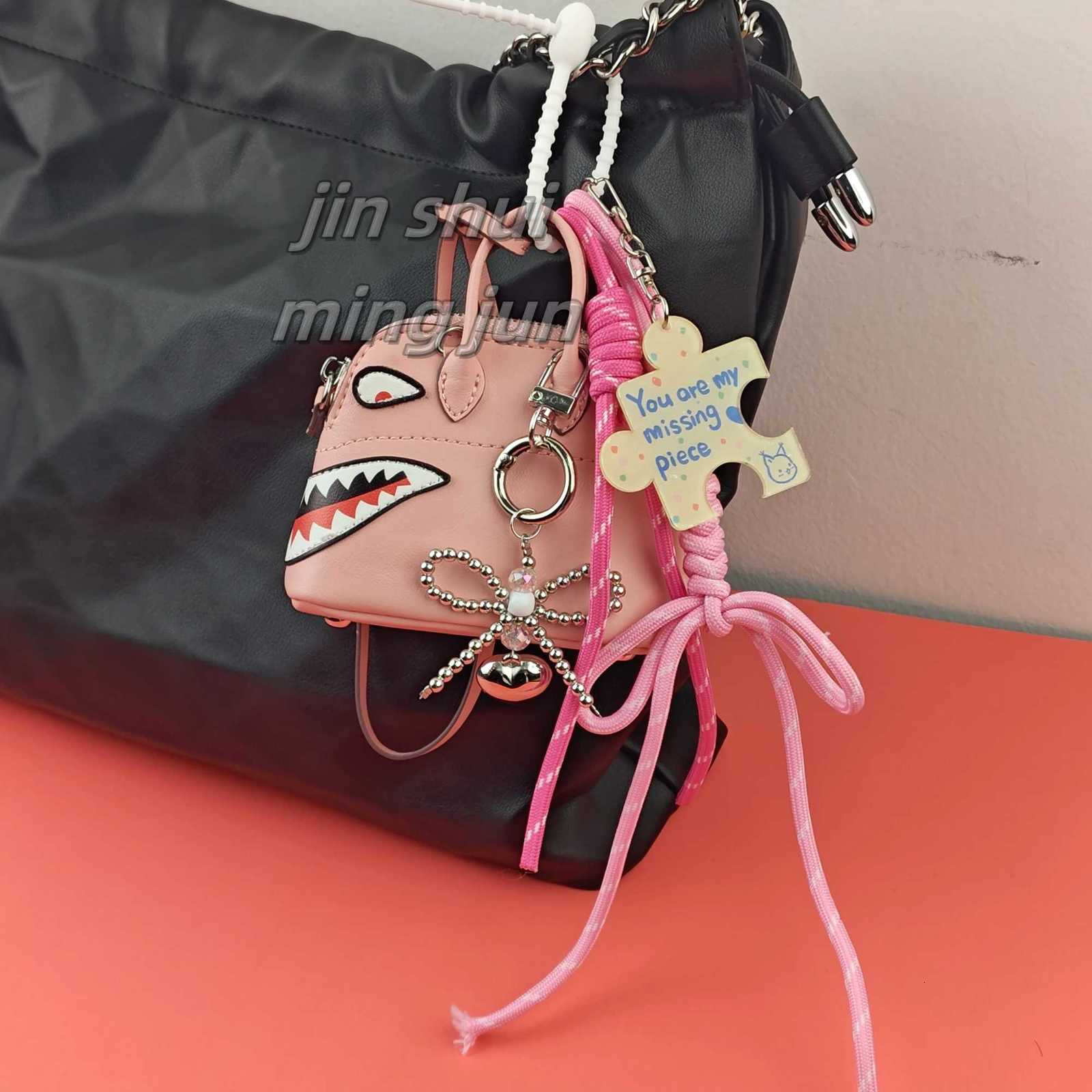 2025 New Extremely Complicated Bag Pendants Versatile Money Bag Charms Keychains Hanging Braided Rope Luxury Birthday GiftW251120