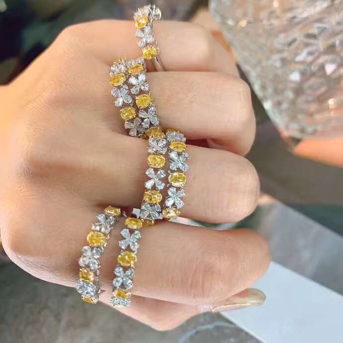 DHCollections 18K Gold Ring with White and Yellow Diamond Leaf Design for Women Stacking Wedding Band Jewellery