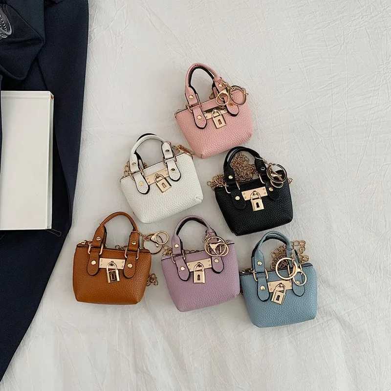 Girls slung hand-held small square bag 2025 summer new classic children carrying one-shoulder messenger bag wallet keychainW251120