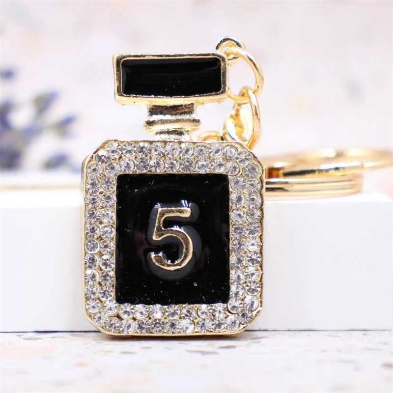 Creative Perfume Bottle Keychain Women Bag Charm Crystal Rhinestone Key Chain Ring Fashion Key Holder Car Keyrings TrinketW251120