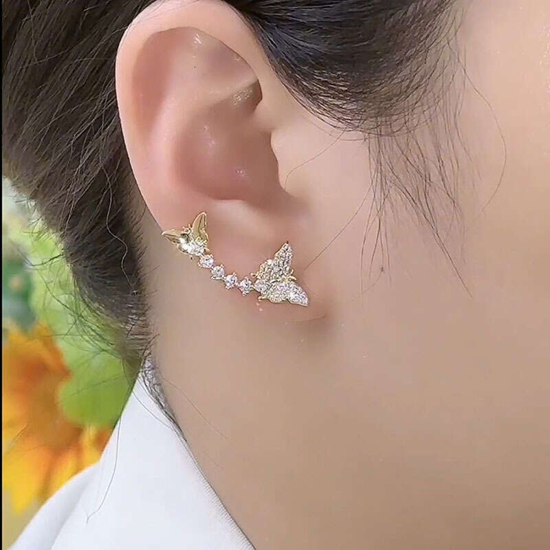 DHcollection Bright Earrings Made of Pure Sier Double Butterfly Cube Zircon for Women