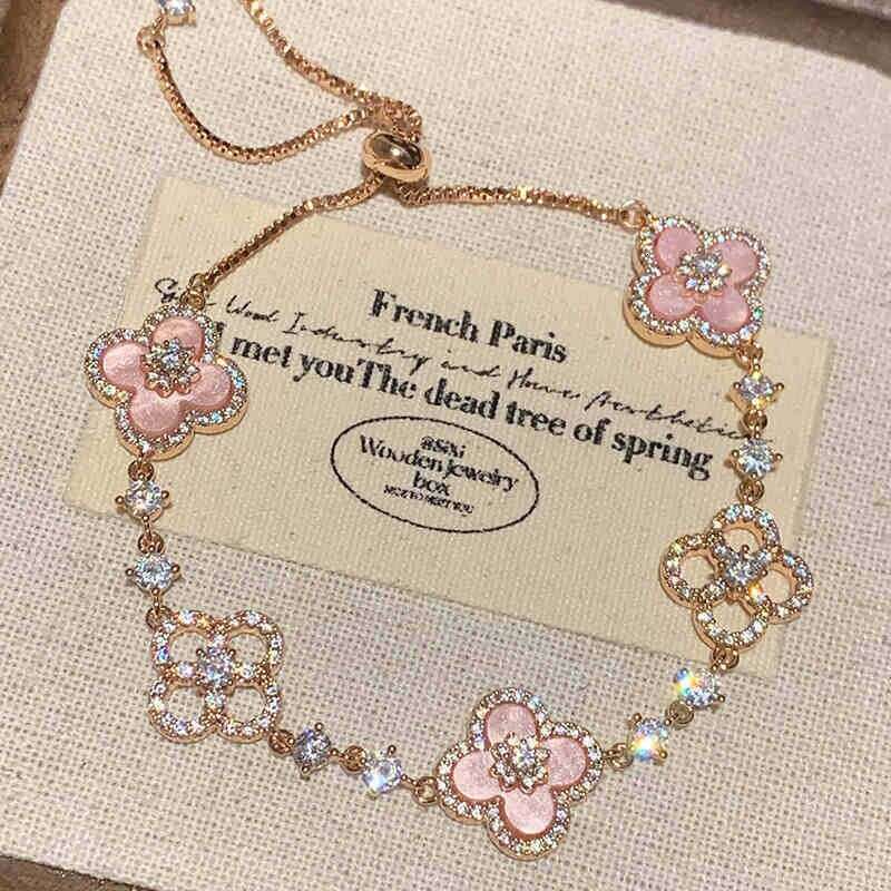 2025 hot Clover Bracelet Designer jewelry Diamond flower hollow out pull-out bracelet light luxury high end feel fashionable commuting versatile 4 Lea