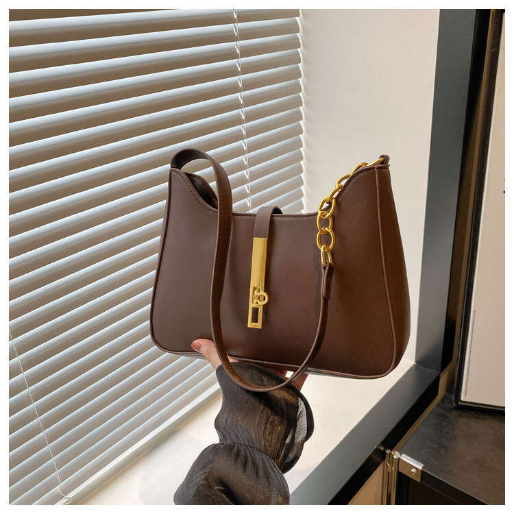 Korean niche design handbag for women in autumn winter 2025, new texture handheld underarm bag, versatile and fashionable shoulder bag