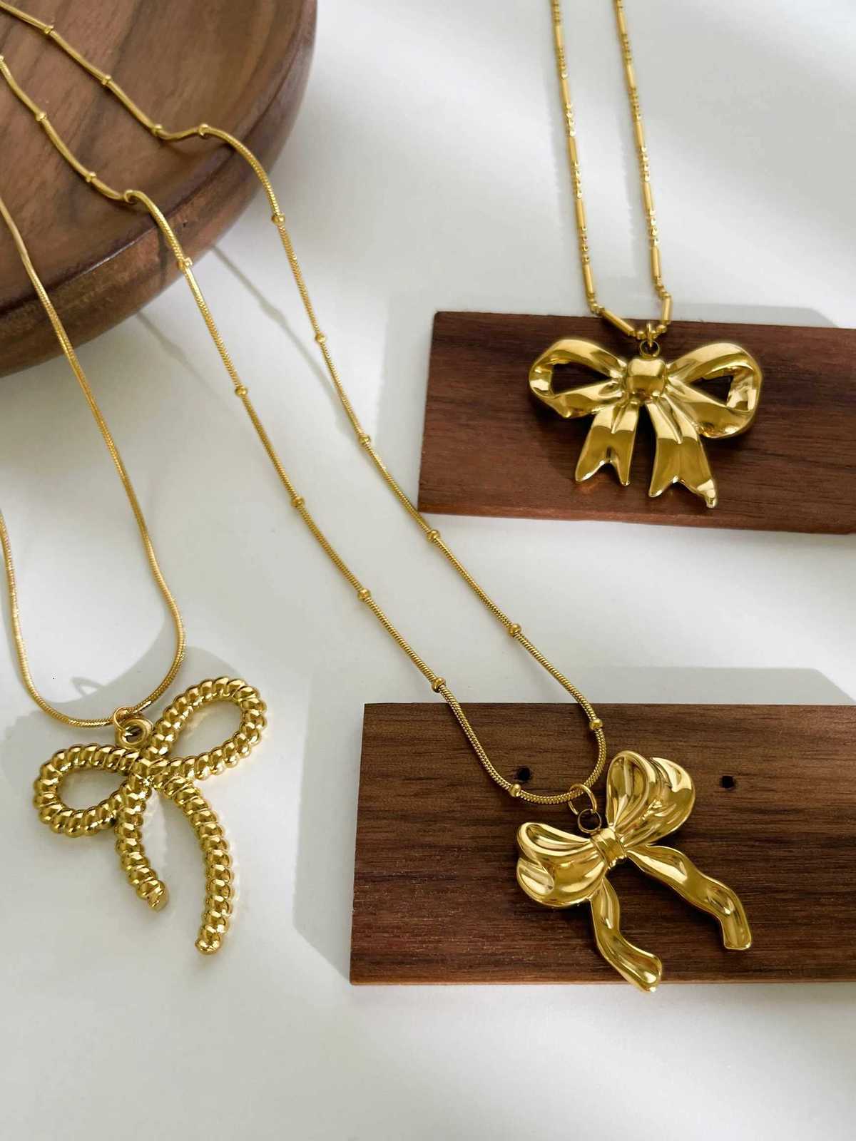 Perisbox Classic Elegant Gold Plated Thin Chain Bow Knot Pendant Necklaces for Women Stainless Steel Waterproof Summer JewelryXJ251121