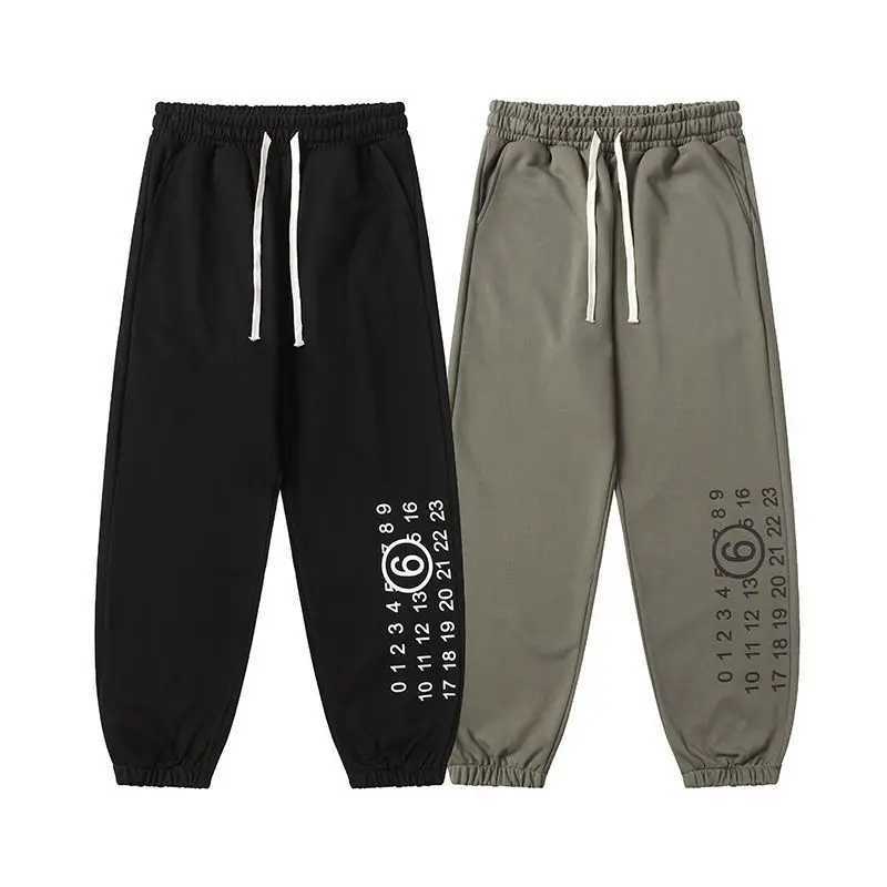 Spring and Autumn Letter Printed Tight Pants Loose Casual Dragging Mens and Womens Sweatpants Thin Inner X250421