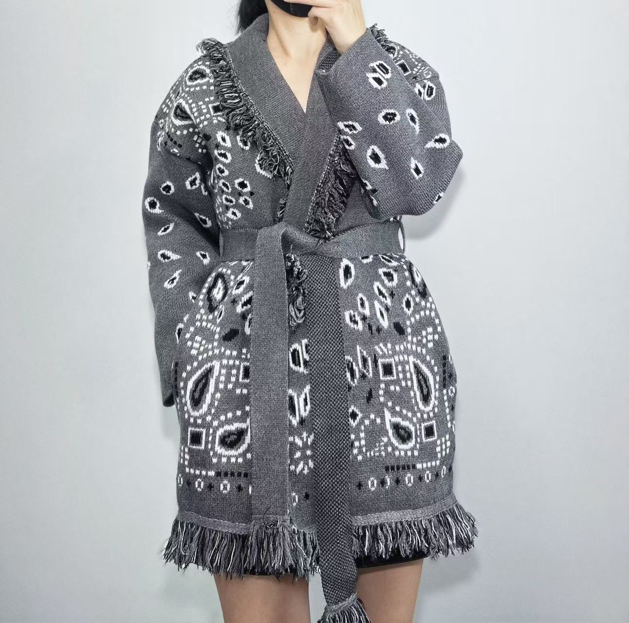 Autumn and winter thick tassel jacquard mid length cardigan womens loose color blocked lapel sweater jacket 230823Z