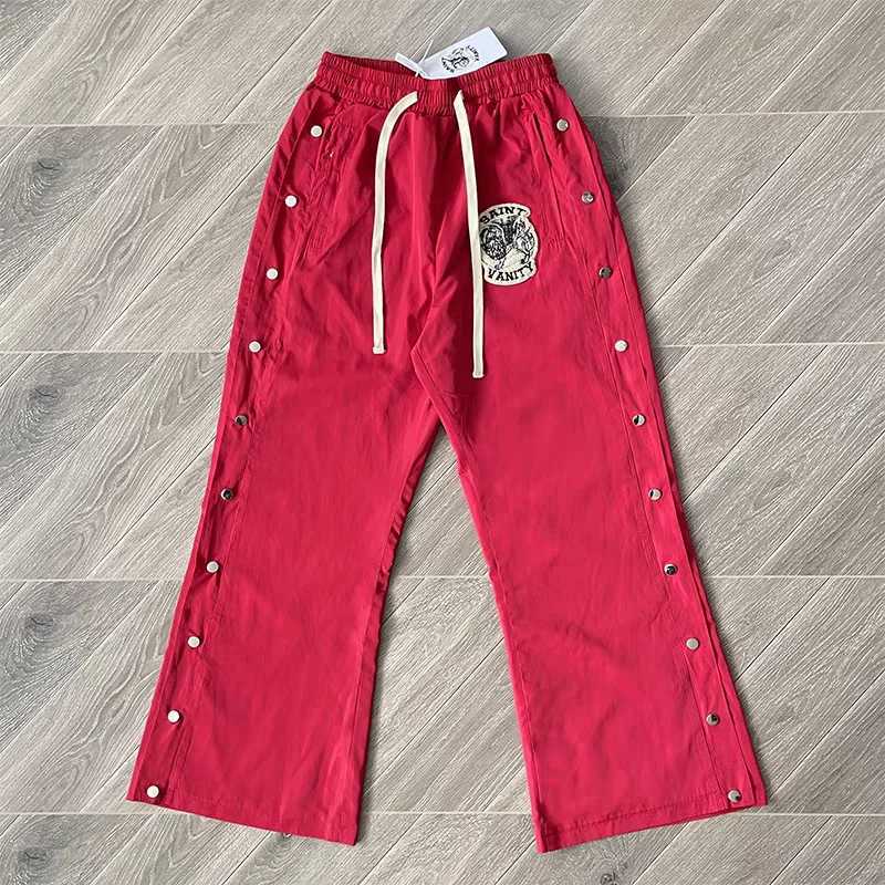 Chic Yellow and Rose Red Tracksuit designed by Saint Vanity features zippered pockets talismans and a positive lifestyle appeal X250421