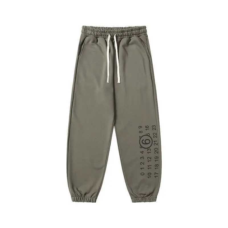 Spring and Autumn Letter Printed Tight Pants Loose Casual Dragging Mens and Womens Sweatpants Thin Inner X250421