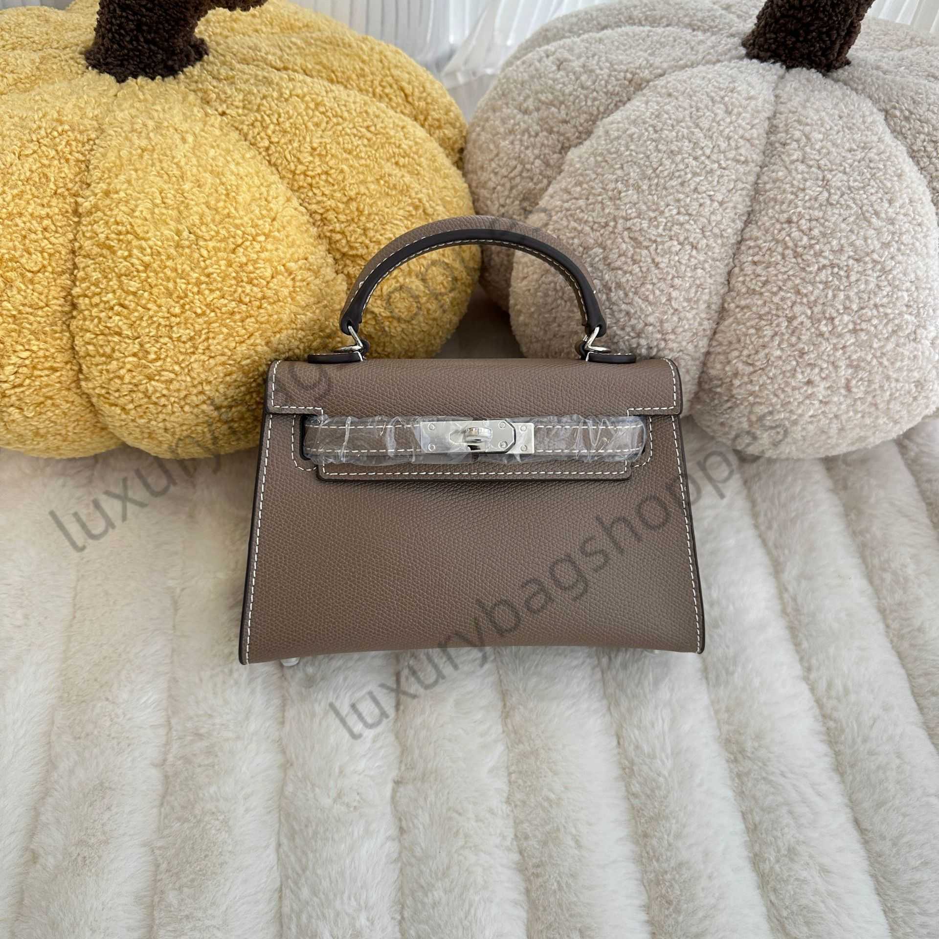 Direct 2025 new Kelly bag niche high-end silver buckle mini handbag fashionable single shoulder crossbody88