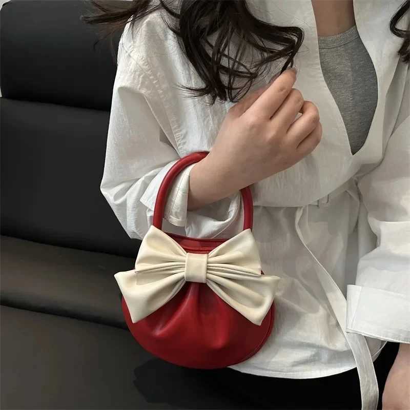 Wens Mini PU Cluh Bag Lightweight Small Purse with Bow Handle Magnetic Closure Coin Purse Soft Tote Handbag for Girls Y251121