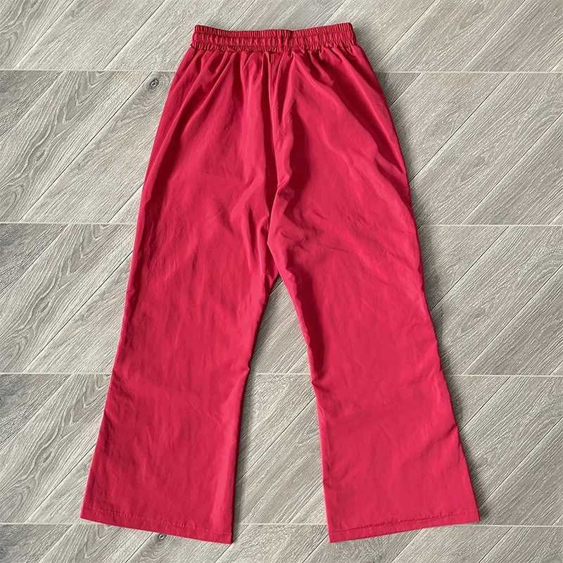 Chic Yellow and Rose Red Tracksuit designed by Saint Vanity features zippered pockets talismans and a positive lifestyle appeal X250421