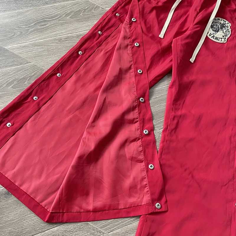 Chic Yellow and Rose Red Tracksuit designed by Saint Vanity features zippered pockets talismans and a positive lifestyle appeal X250421