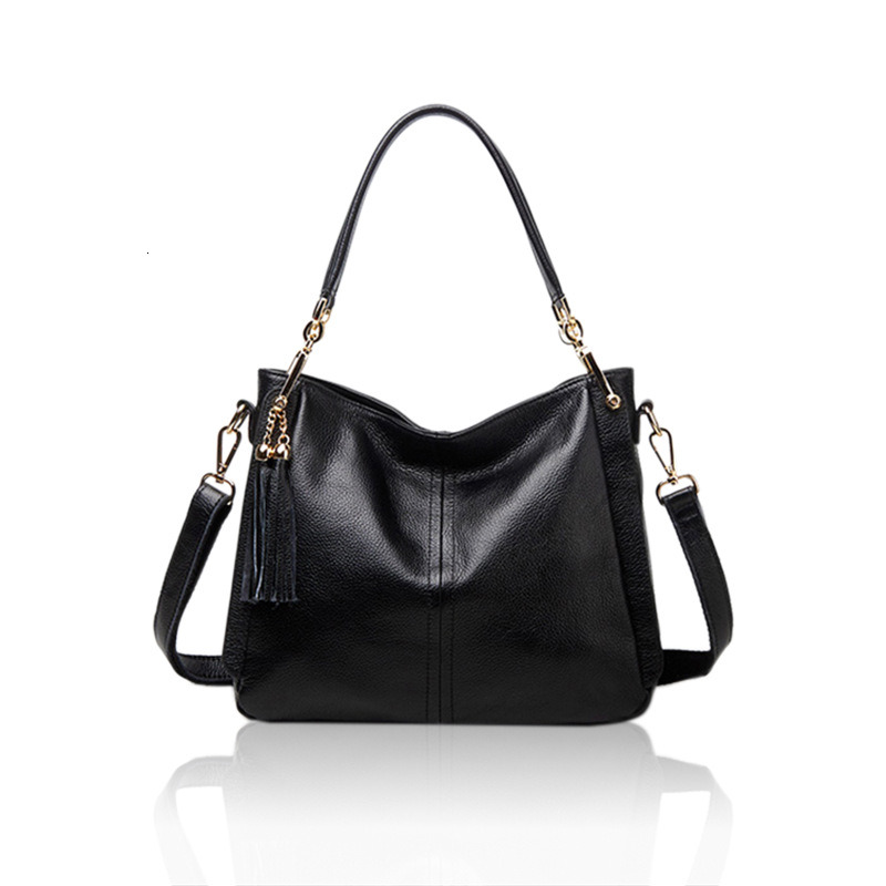 Fashionable new top layer cowhide shoulder bag with tassels, simple and versatile leather shoulder bag for women