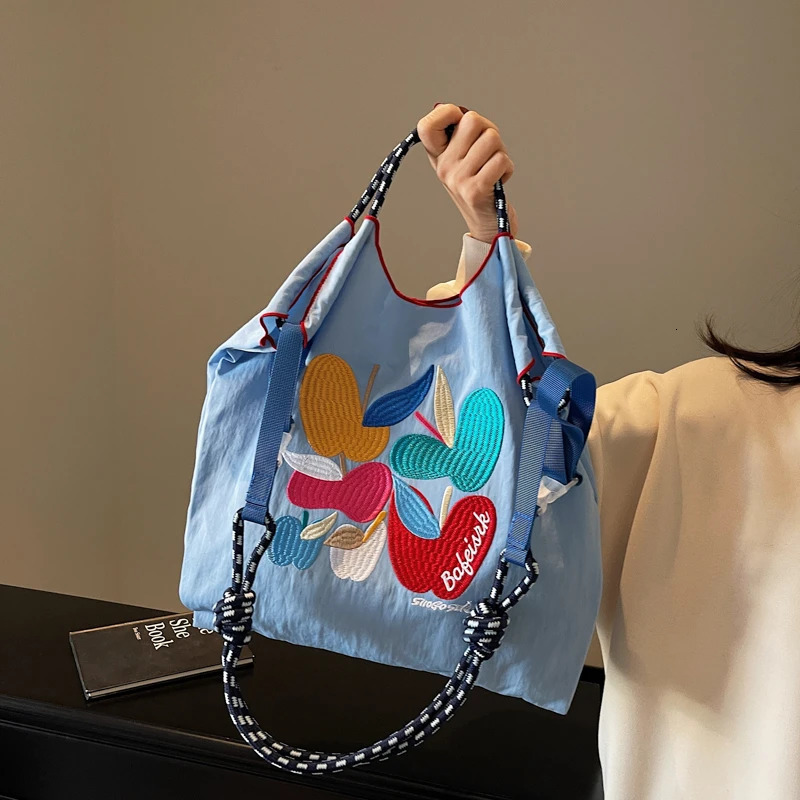 womens handbag lazy in the wind Japanese embroidery fashionable clown large capacity durable shoulder bag commuting messenger 250421