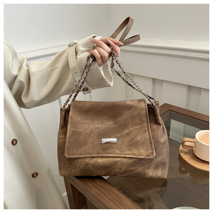 2025 New Designer Light Luxury Commuter High End Multi Functional Handchain Armpit Bag Simple Large Capacity Single Shoulder Crossbody Bag