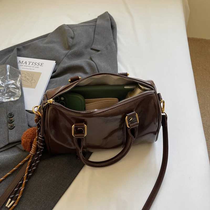 High-end feel small baggages for women unique design versatile hand-held Boston bag pillow bagT251122