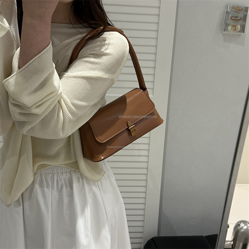 2025 New Fashion Designer PU Handheld Multi Functional Inner Shoulder Women's Bag Niche Western Underarm Bag