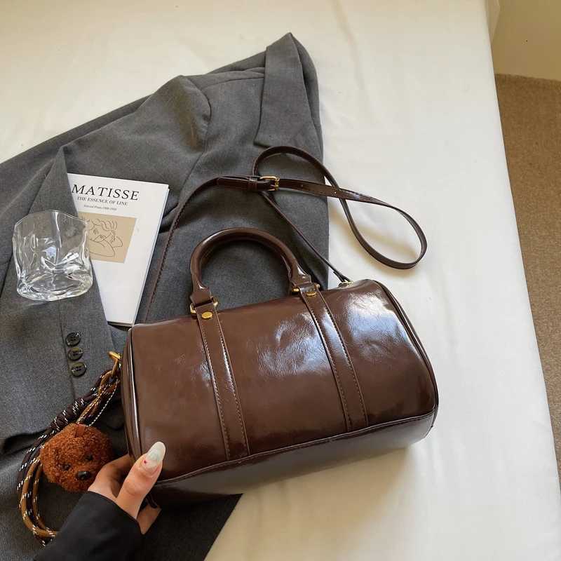 High-end feel small baggages for women unique design versatile hand-held Boston bag pillow bagT251122