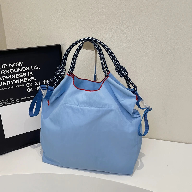 womens handbag lazy in the wind Japanese embroidery fashionable clown large capacity durable shoulder bag commuting messenger 250421