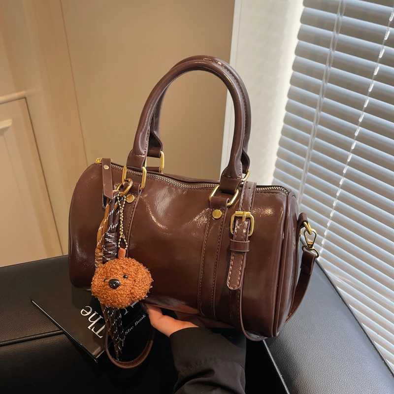 High-end feel small baggages for women unique design versatile hand-held Boston bag pillow bagT251122