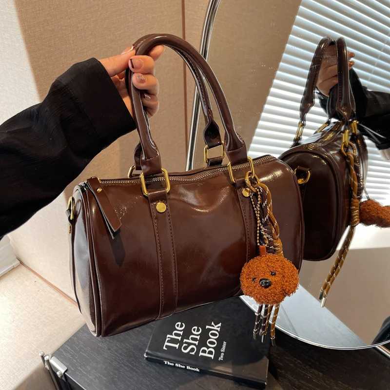 High-end feel small baggages for women unique design versatile hand-held Boston bag pillow bagT251122