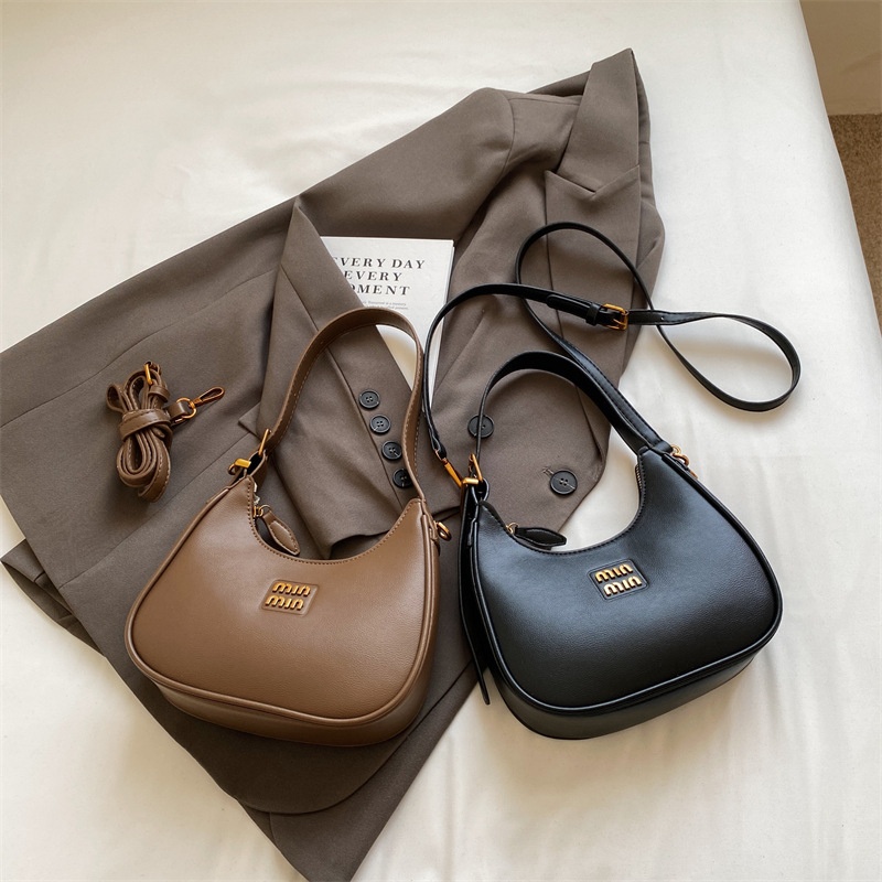 2025 New Free Shipping Hot selling Women's Bag Simple and Versatile Underarm Bag Designer black white color Women's Versatile Fashion Handba