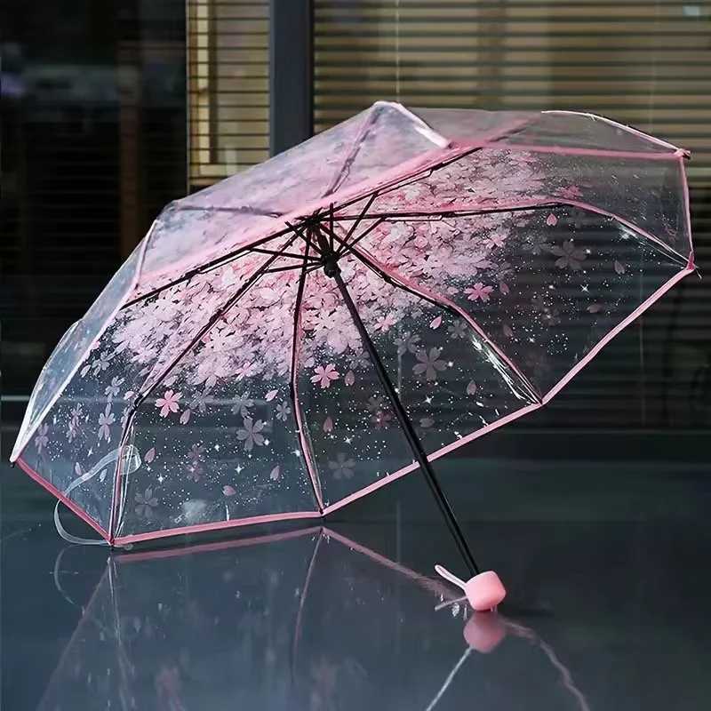 This transparent cherry blossom umbrella features a stylish and unique three-fold design presenting a fresh and simple aestheticM251122